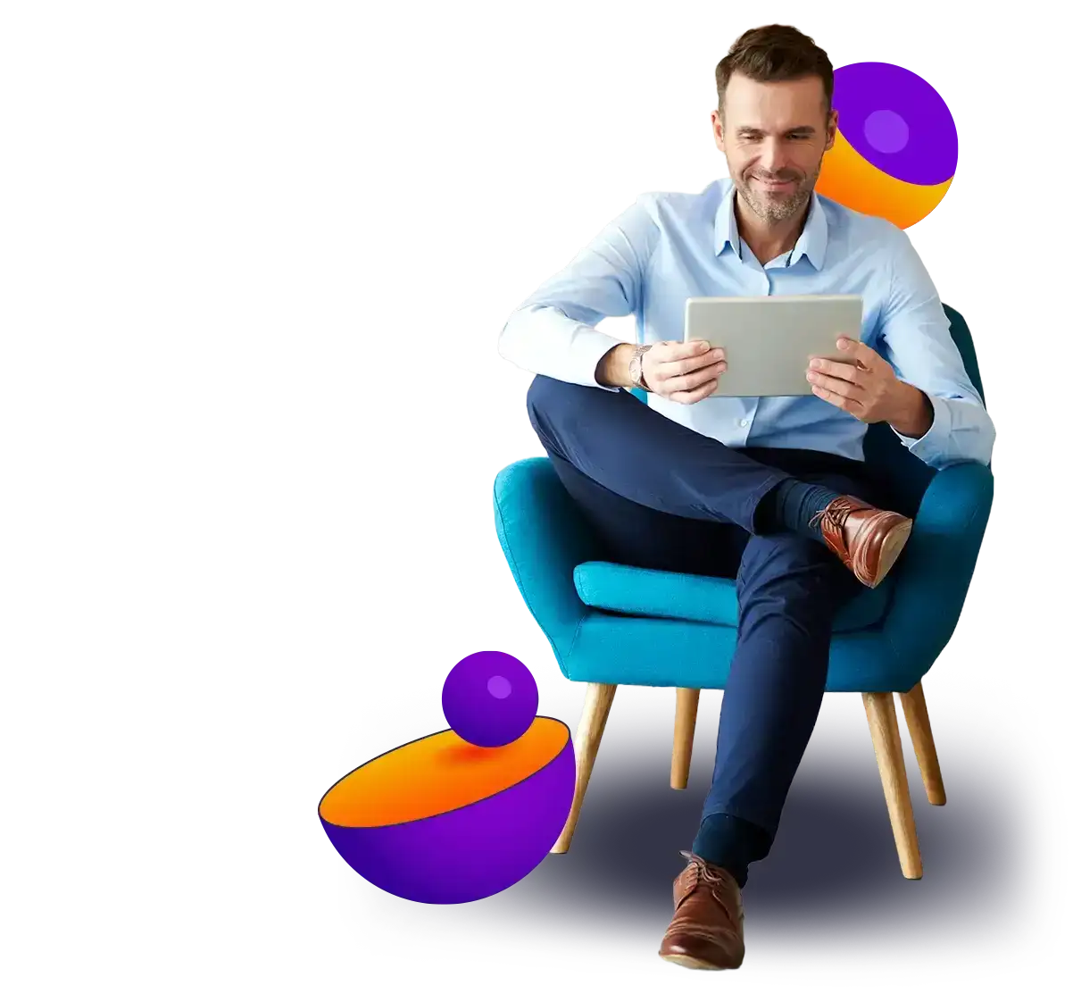Man sitting on a chair looking at a tablet.