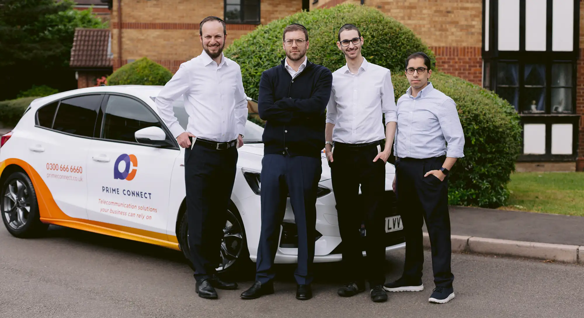 The Landlord Connect team in front of a branded vehicle.